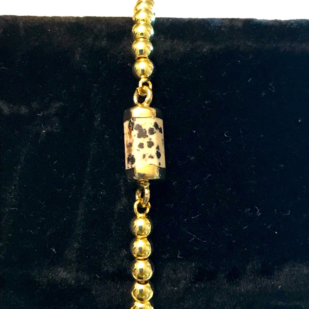 One-of-a-kind hand made adjustable bracelet with Dalmatian Turquoise pendant.